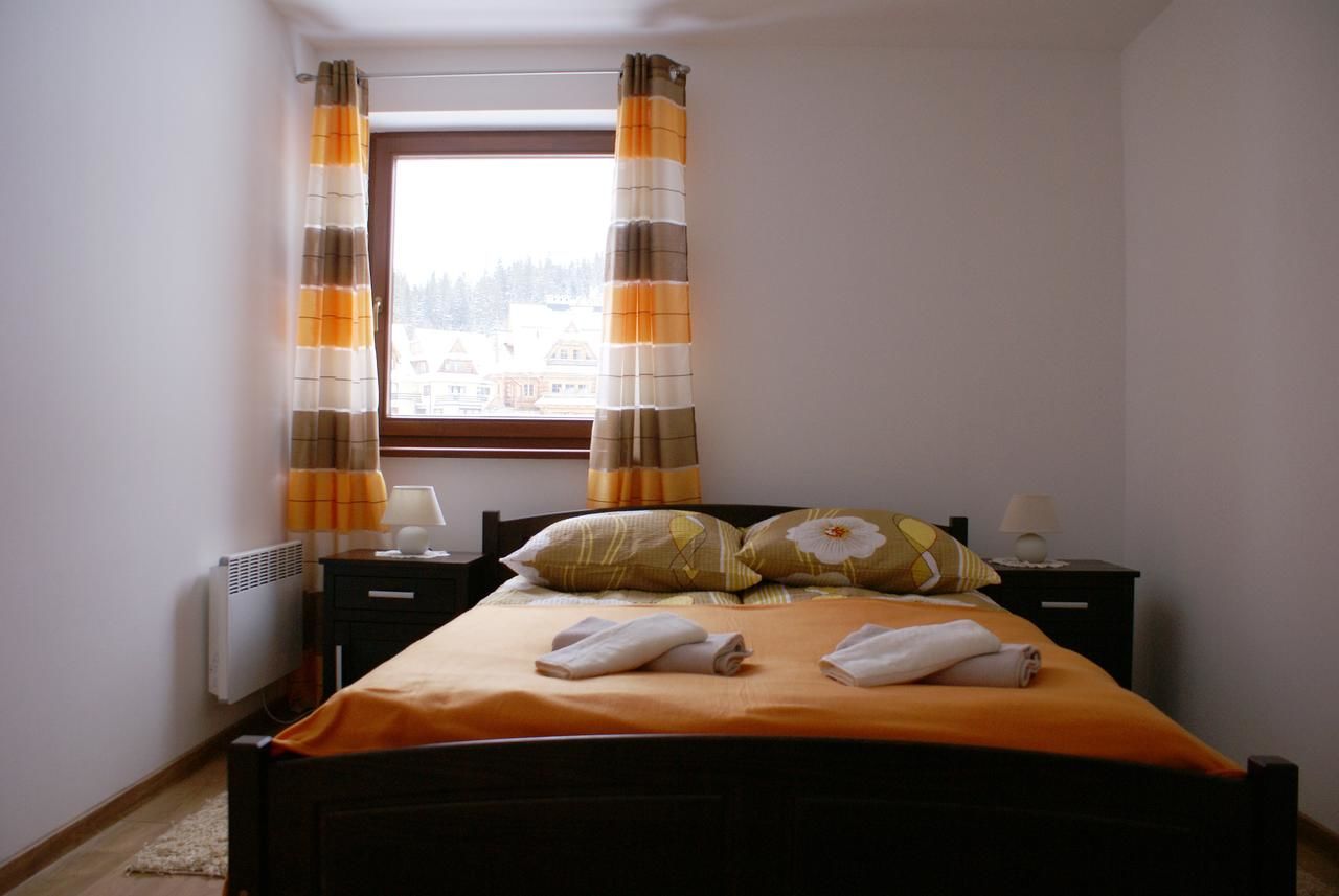 Апартаменты Apartament Słoneczny Koscielisko Косцелиско-15